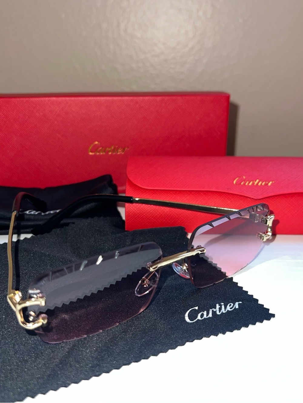 Cartier Rimless Sunglasses with Pink Gradient Lenses and Gold Accents